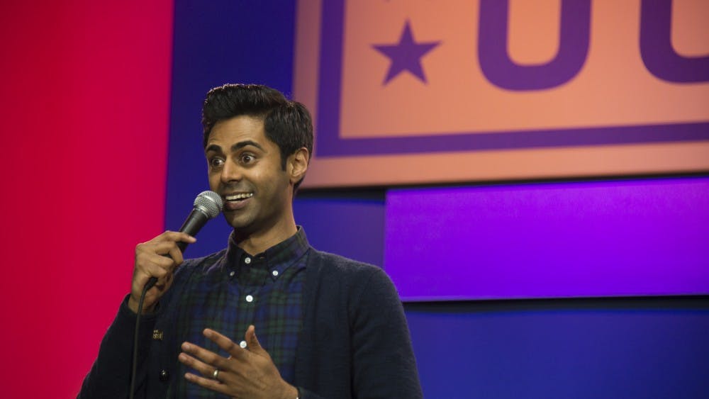 U.S. Air Force photo/Staff Sgt. Kat Justen 
Hasan Minhaj adapts his usual stand-up persona for a weekly Netflix show.