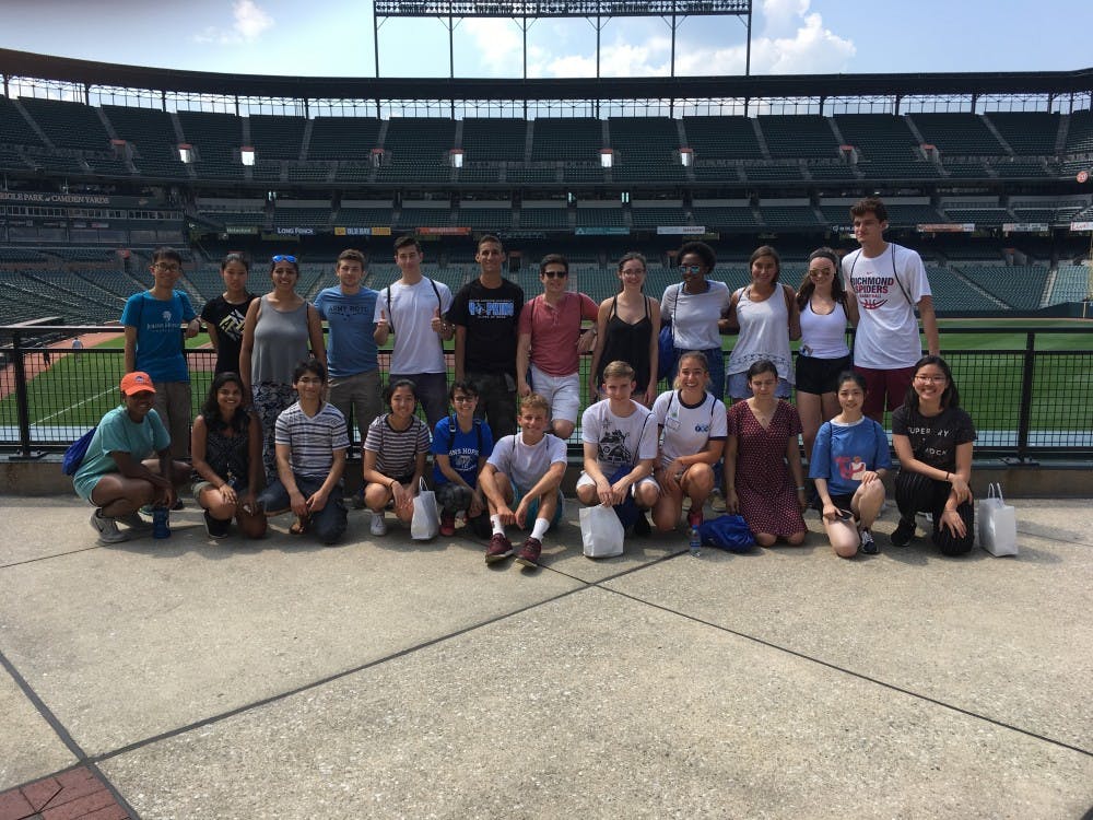 Courtesy of Julie Awad
First-year students pose with their FYM group inside Camden Yards on one of their trips to explore Baltimore.