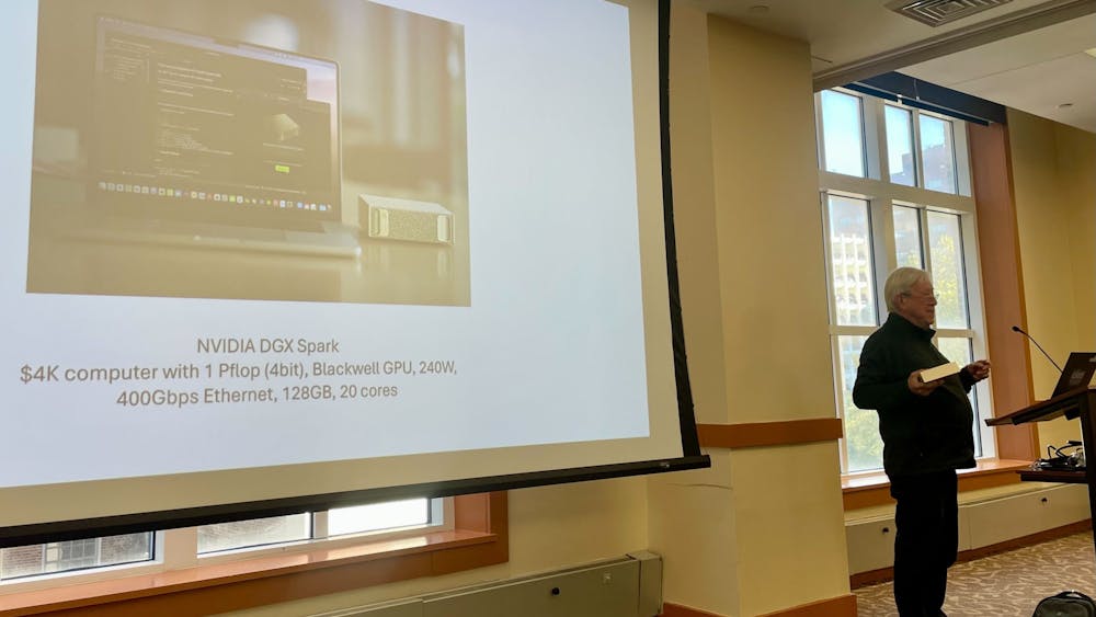 COURTESY OF ANDREW WU
Alex Szalay, Bloomberg Distinguished Professor of Big Data and Director of IDIES, showcases the NVIDIA DGX Spark to demonstrate the incredible recent progress in computing technology.