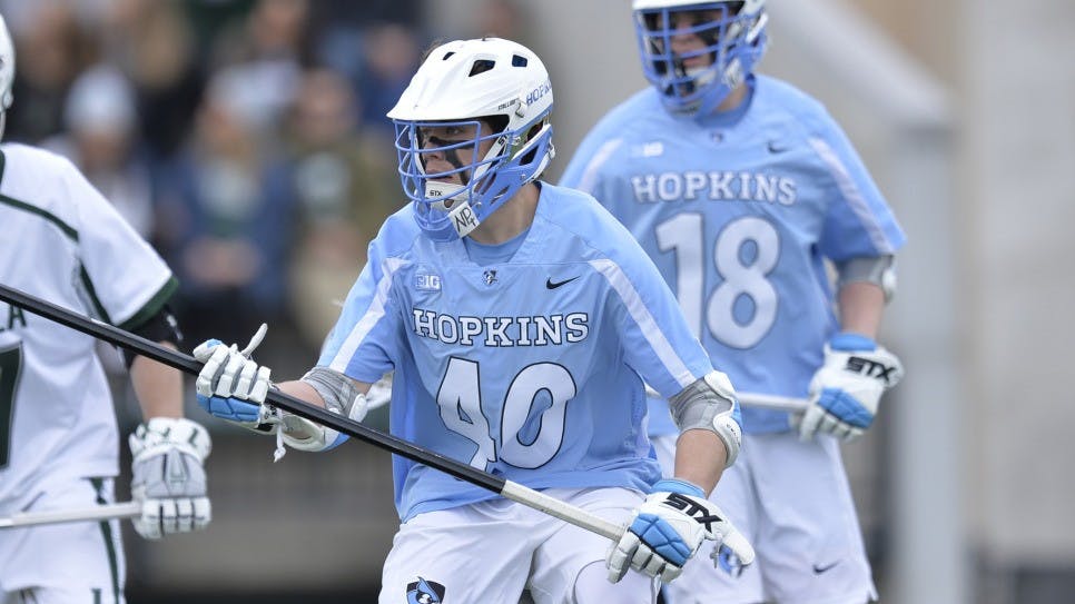 hopkinssports.com
Junior Austin Spencer displays his handling abilities against Rutgers.