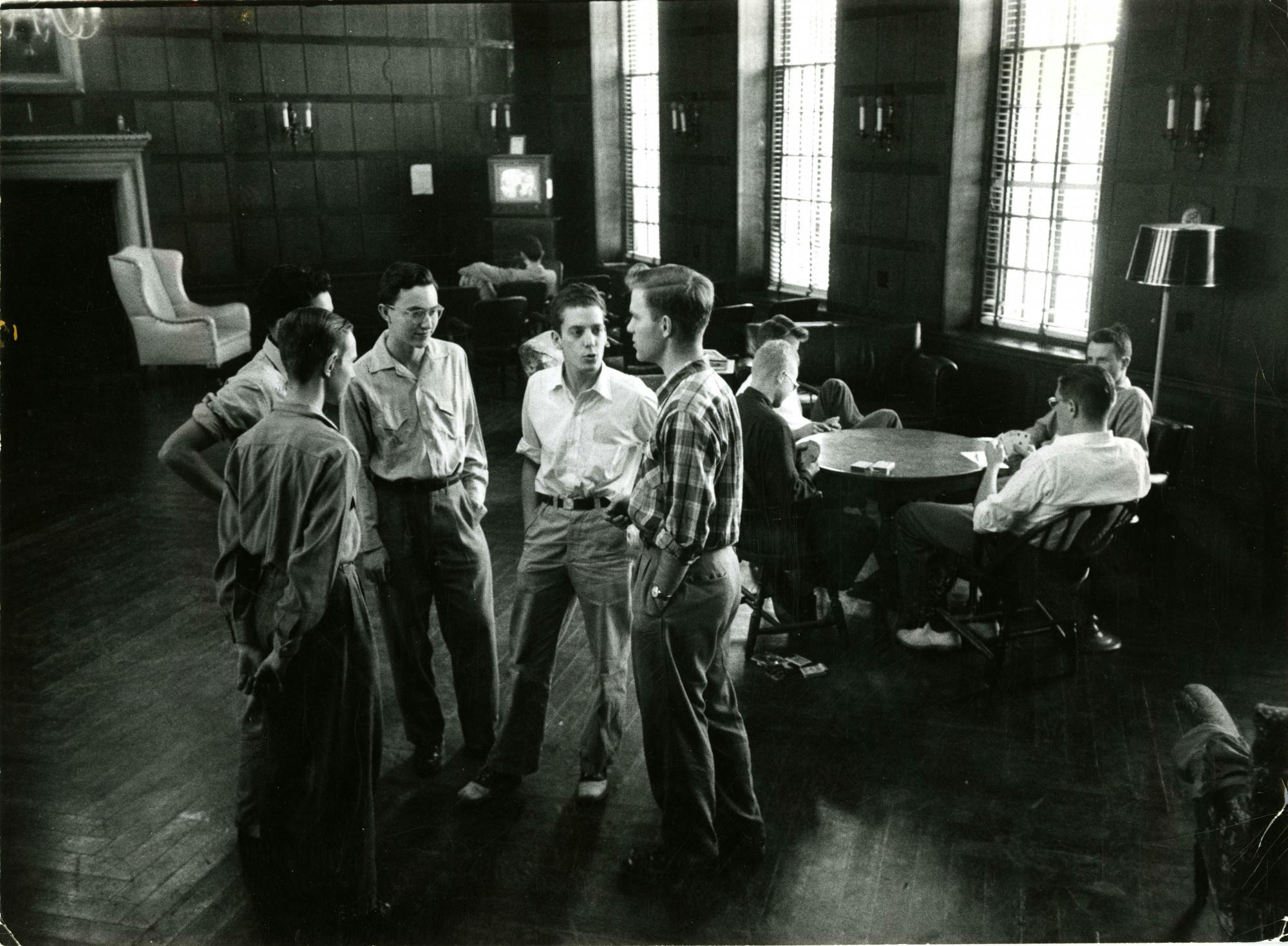 COURTESY OF THE UNIVERSITY ARCHIVES — SHERIDAN LIBRARIES&nbsp;
Students discuss among themselves in AMR I circa the 1950s, around the time Baensch wrote for The News-Letter.