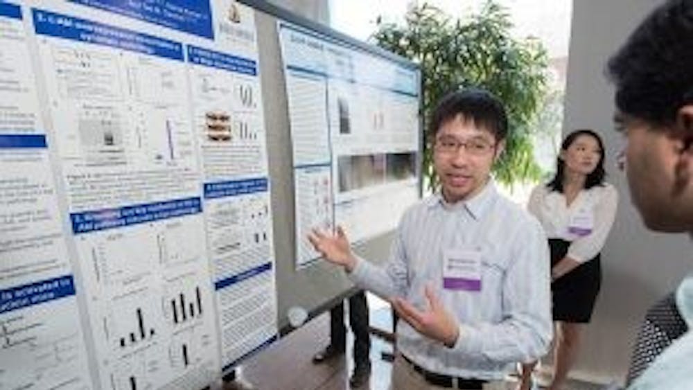  COURTESY OF PRESTON GE
Ge presents a poster about his research on misfolded Alzheimer protein for the PURA poster session.