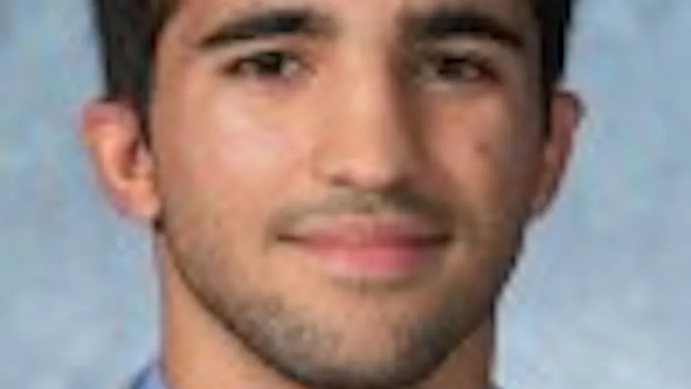 HOPKINSSPORTS.COM
Junior Ricky Cavallo won at Messiah.