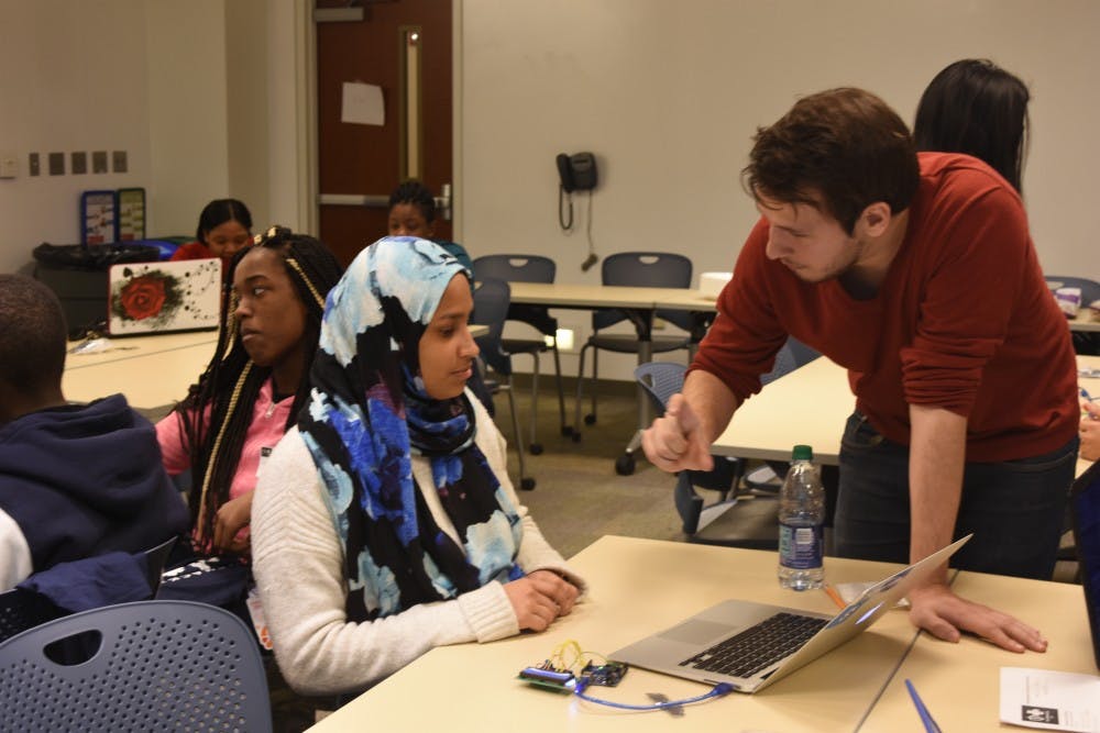 COURTESY OF KATHY HU
Medhacks volunteers worked with Baltimore high schoolers at the event.