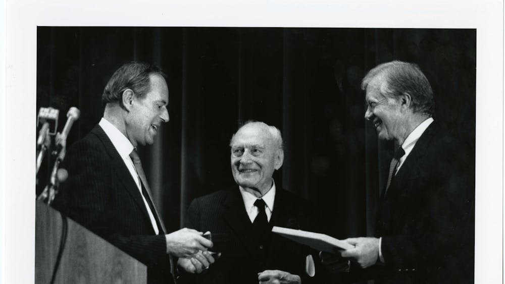 One of Gum's most memorable stories was covering the address to freshmen by then-University President Steven Muller, pictured in 1987 with former U.S. President Jimmy Carter and Alfred Carl Toepfer.
