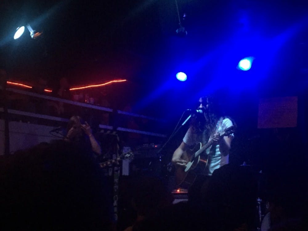  COURTESY OF KATHRYN BUCHSER
Kurt Vile (right) plays guitar in his recent Ottobar show, where he exhibited everything from classic ‘70s rock to skilled banjo.