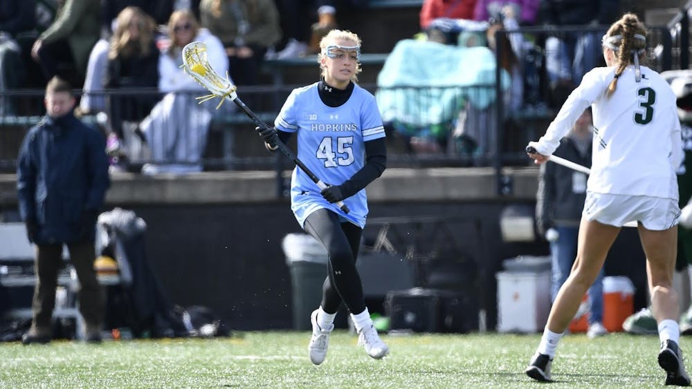 HOPKINSSPORTS.COM
Aurora Cordingley scored three goals and had two assists against Loyola.