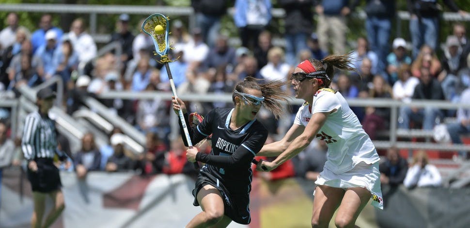HOPKINSSPORTS.COM
Junior attack Emily Kenul was one of three Blue Jays to score against the Quakers.