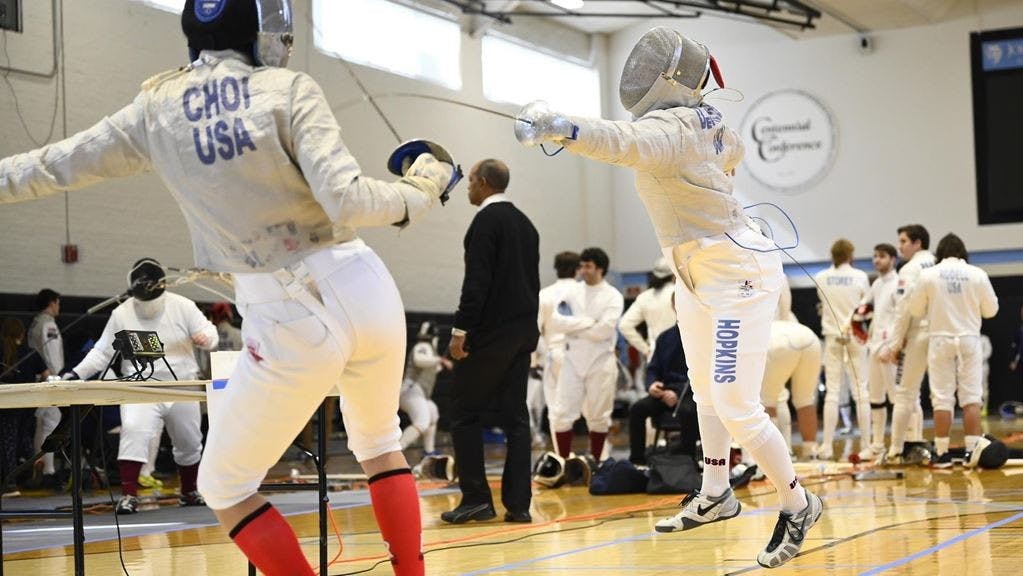 HOPKINSSPORTS.COM
The men’s team placed three in the top 20 in their respective weapons.