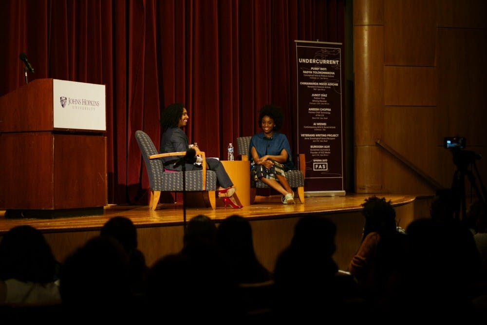COURTESY OF KUNIL MAITI
Hopkins MFA graduate Chimamanda Ngozi Adichie (right) spoke out against the institutionalization of dehumanizing language in the United States.