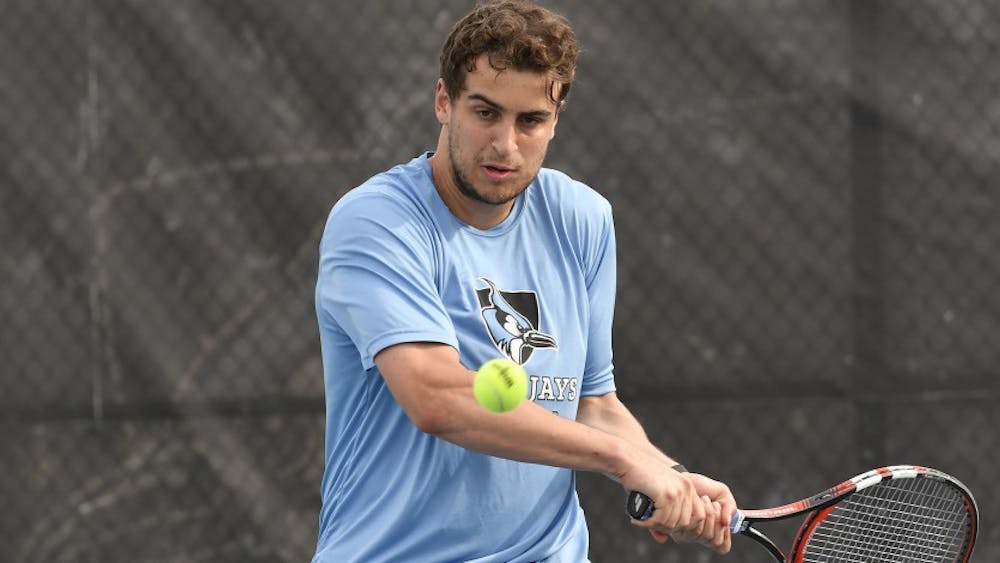 HOPKINSSPORTS.COM
Both the men and women beat Muhlenberg but fell to Carnegie Mellon.