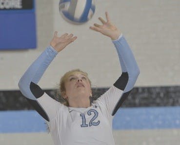 HOPKINSSPORTS.COM
Sophomore Kristi Rhead sets for a teammate.