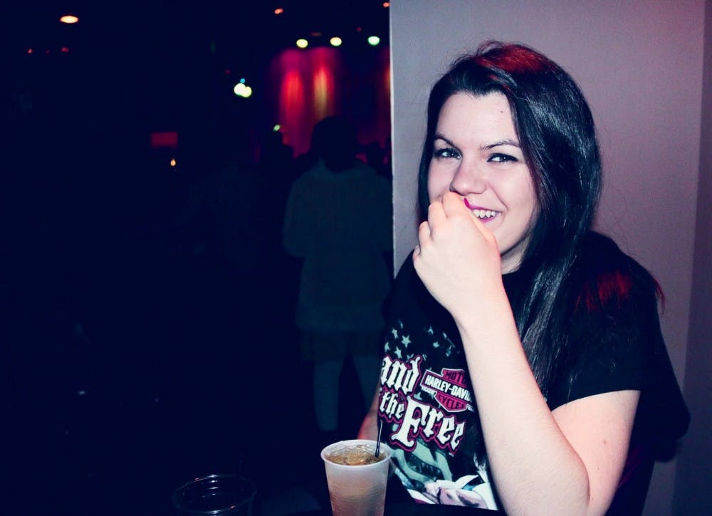 COURTESY OF MIA CAPOBIANCO
Jane Morris at Metro Gallery in Station North, whiskey sour in hand.