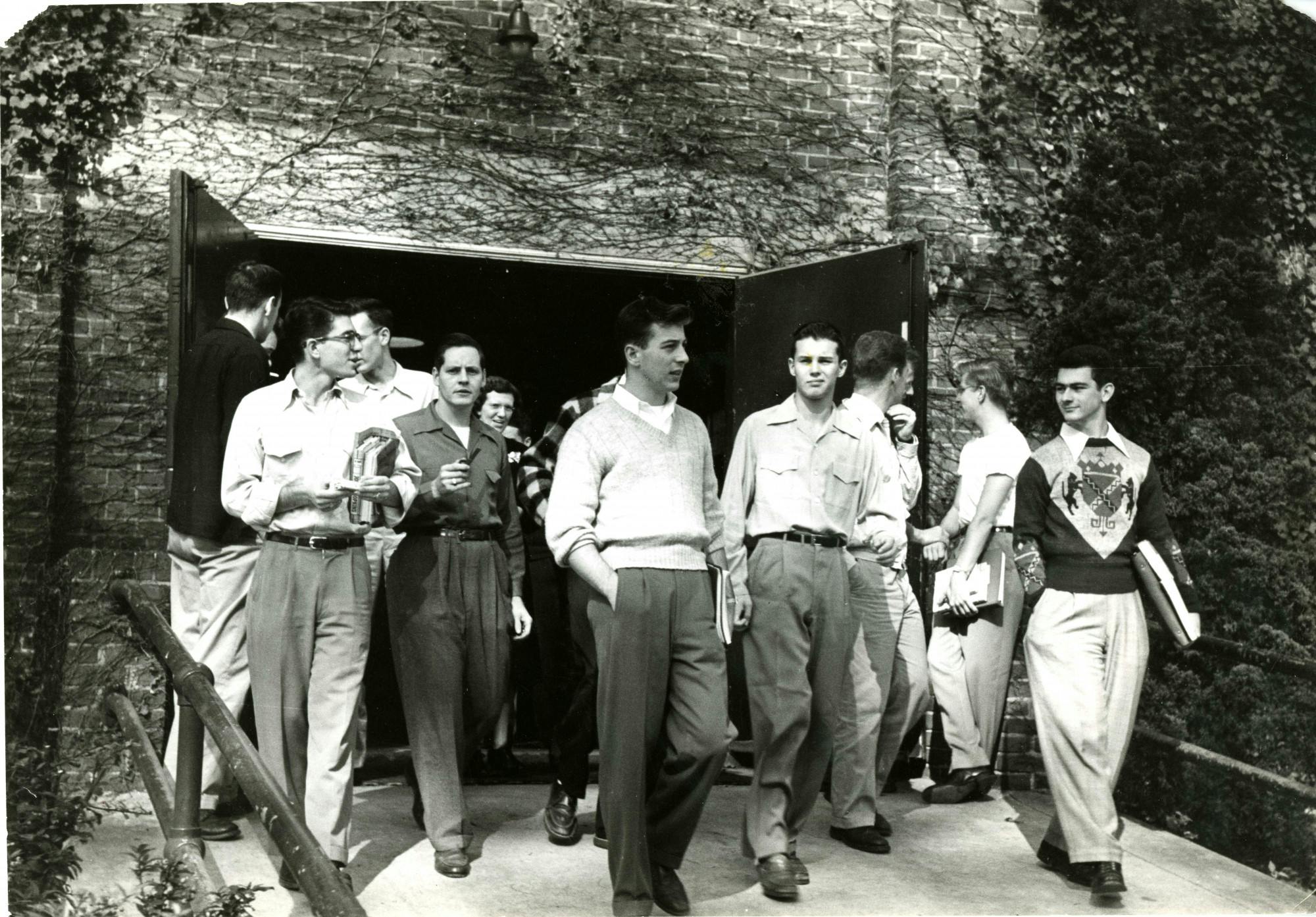 COURTESY OF THE JOHNS HOPKINS UNIVERSITY GRAPHIC AND PICTORIAL COLLECTION
Students exit a building after class circa the 1950s, around when Cleveland first arrived at Hopkins.