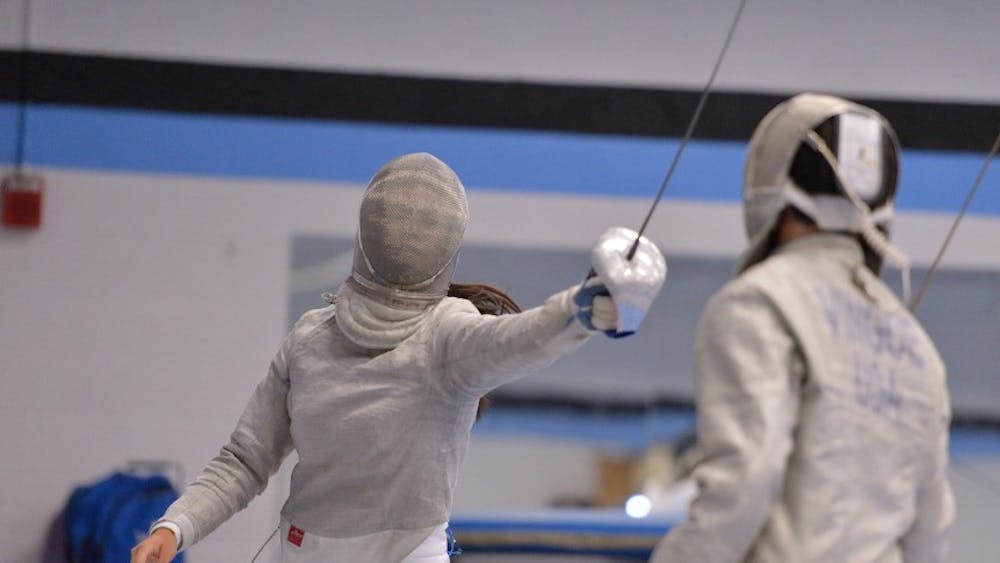 HOPKINSSPORTS.COM
The Hopkins men’s and women’s fencing teams traveled to Haverford College to compete in the Dan Arnstein Invitational, where both teams finished the day 3-0. 