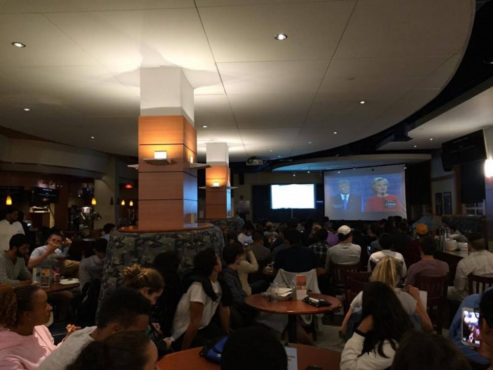 COURTESY OF DIVYA BARON
Students gathered in Nolan’s to watch the first presidential debate.