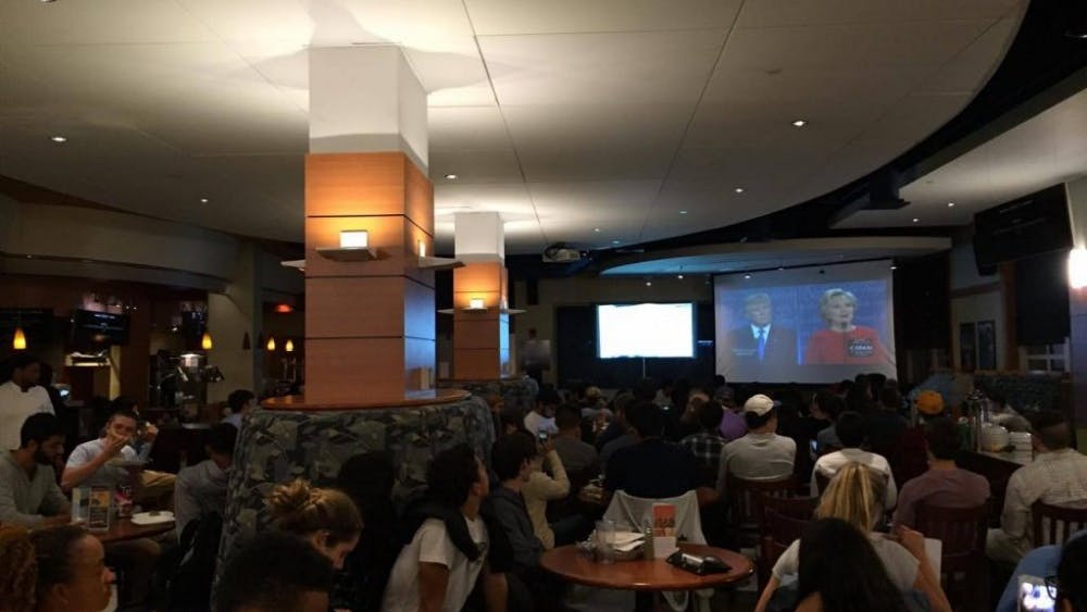  COURTESY OF DIVYA BARON
Students gathered in Nolan’s to watch the first presidential debate.