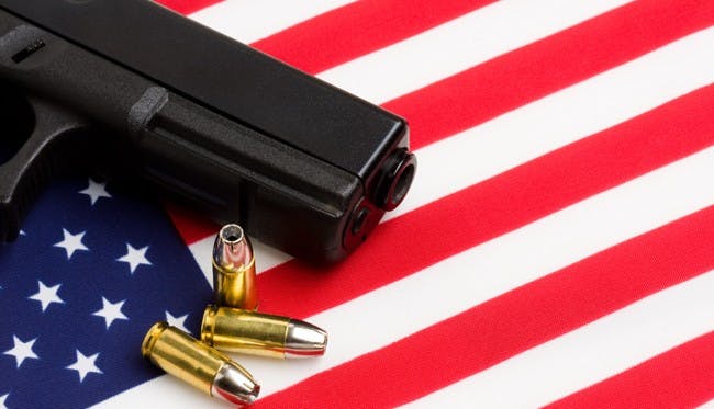 gun over american flag