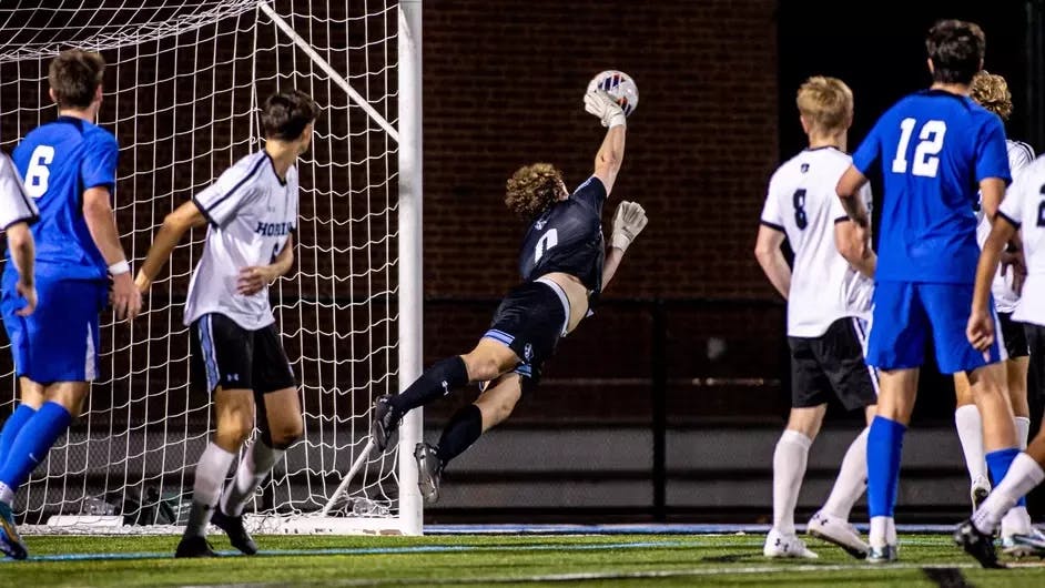 COURTESY OF HOPKINSSPORTS.COM &nbsp;&nbsp;
Sophomore goalkeeper Simon Turner makes a diving save in a close 2-1 victory over ranked Franklin and Marshall.
