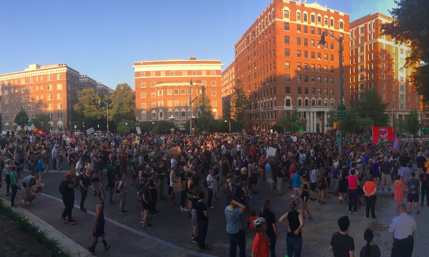 Courtesy of ROLLIN HU
Demonstrators marched down N. Charles St. as a show of solidarity for the counter-protesters in Charlottesville.