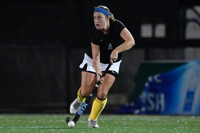 HOPKINSSPORTS.COM
When the Jays Field Hockey team took the field on Friday night, they were adorned with striking yellow socks. 