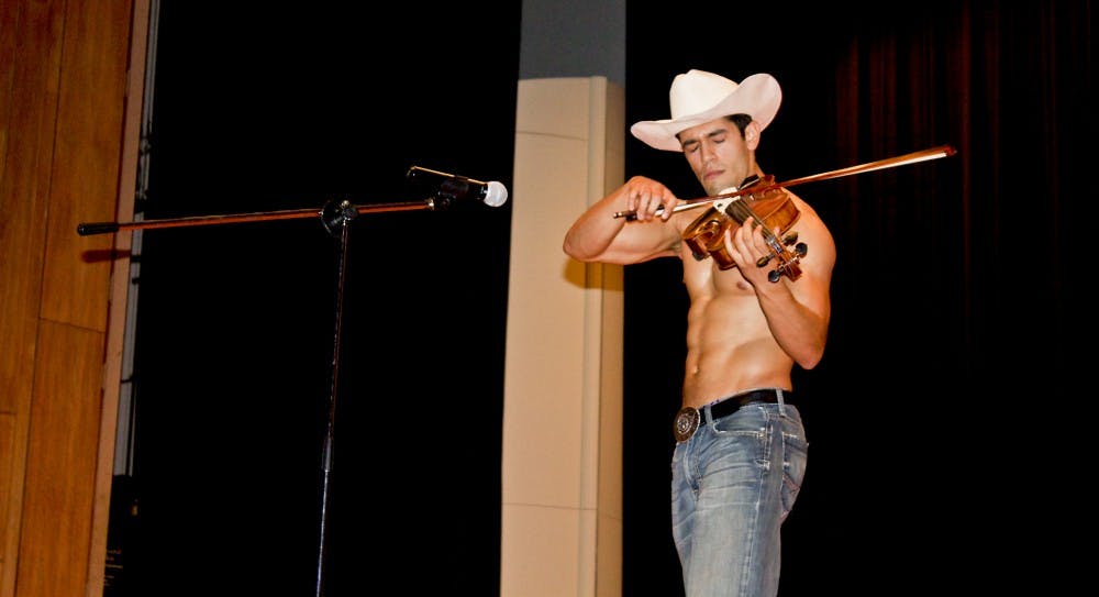 Joel Ramirez, a contestant in the Mr. Phi Mu pageant, came in third place despite a strong performance as a fiddler in the talent portion of the show.JASMIN GONZALEZ/ PHOTOGRAPHY STAFF