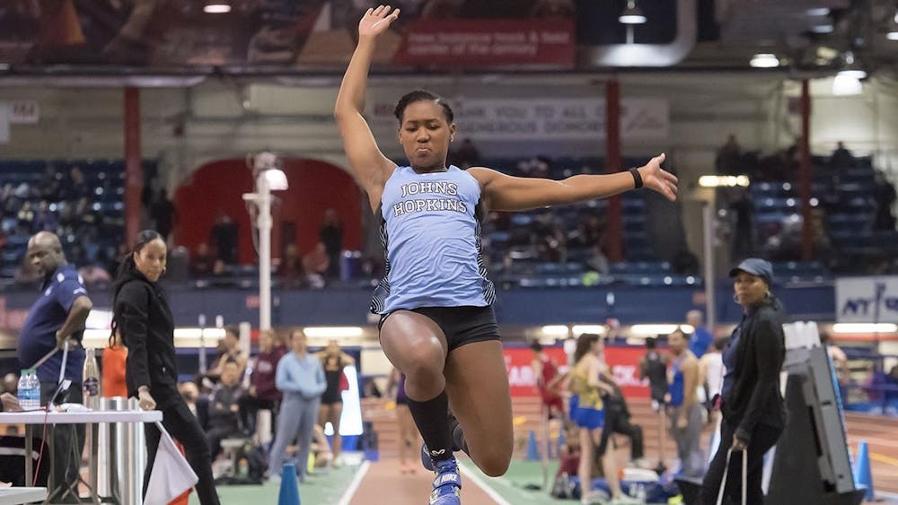 HOPKINSSPORTS.COM
Freshman Cherease Lamm did well in both the triple and the long jump.