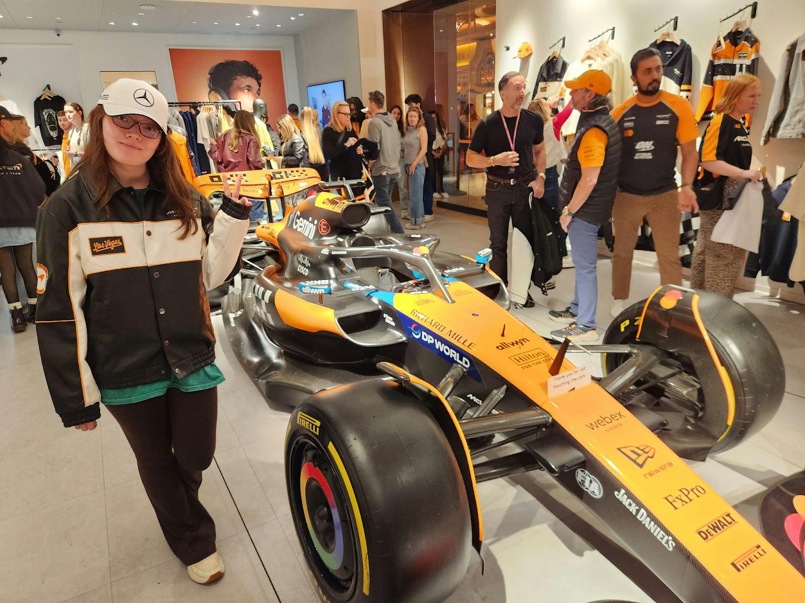 COURTESY OF SAFFRON HALLETT
Hallett next to Lando Norris’s Mclaren F1 car at the Wynn in Las Vegas.
