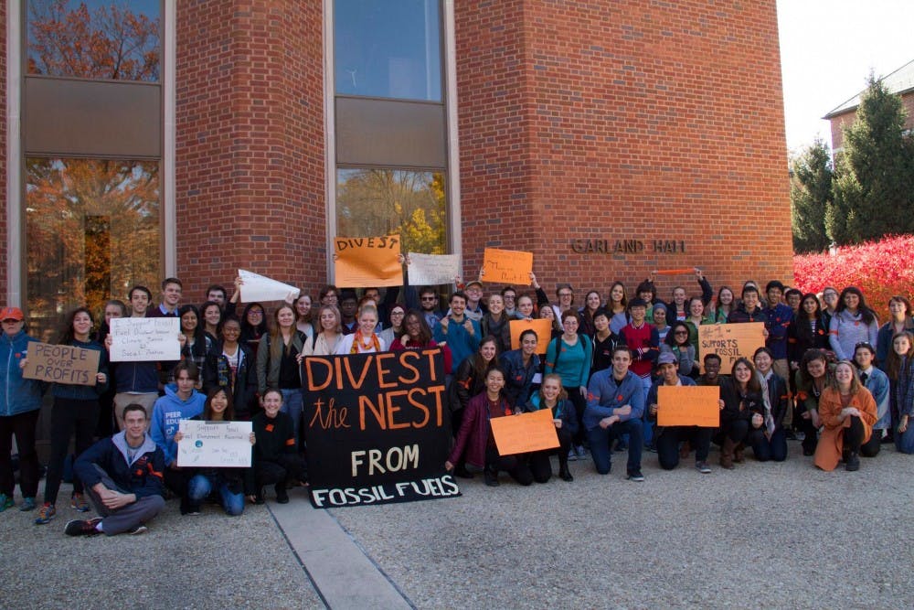 Courtesy of CLARISSA CHEN
Supporters of fossil fuel divestment gathered outside Garland Hall before holding a sit-in.