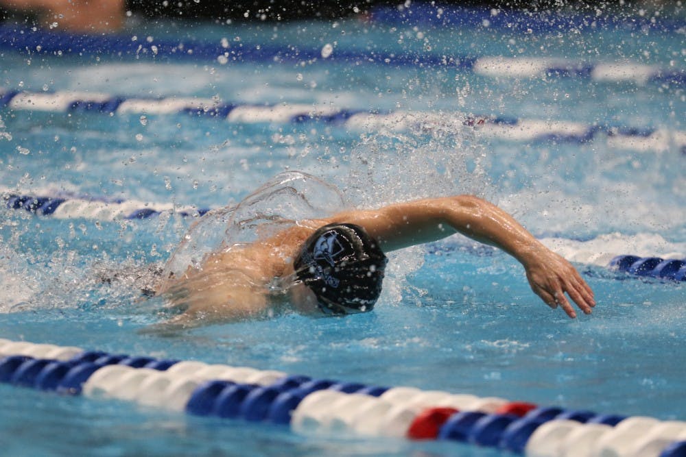 HOPKINSSPORTS.COM
The men's swimming team beat Delaware but lost to host UMBC Saturday.