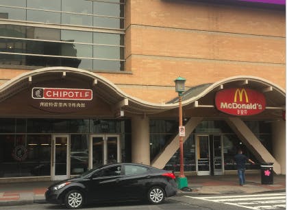 COURTESY OF ROLLIN HU
Chain restaurants, which now dominate Chinatown, are required to post signage in Chinese, too.