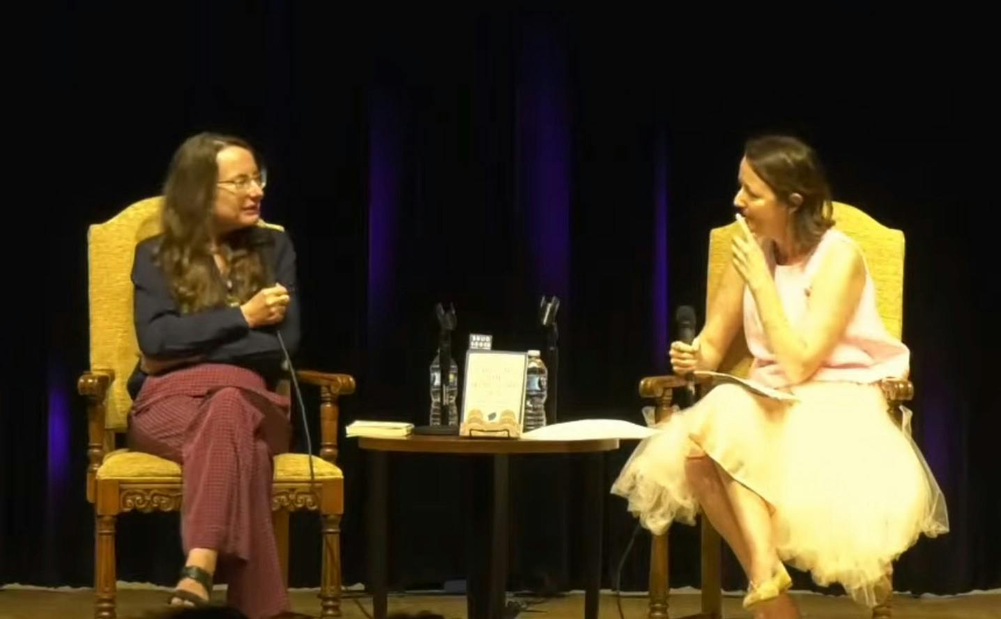 COURTESY OF ENOCH PRATT FREE LIBRARY
Emily Wilson talks with Karen ní Mheallaigh at the Enoch Pratt Central Library.