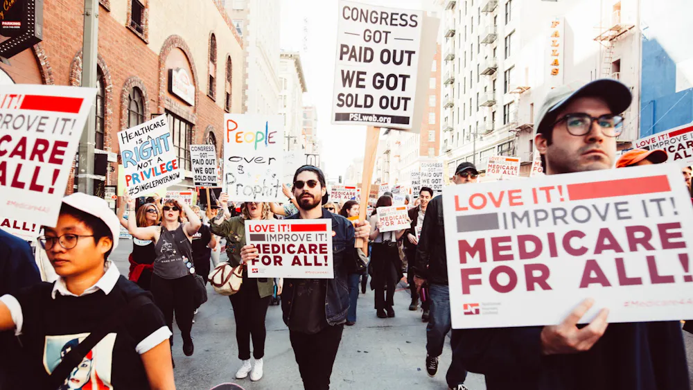 CC By 2.0
A rally in LA in support of Medicare for All, which Ravi argues in favor of. 