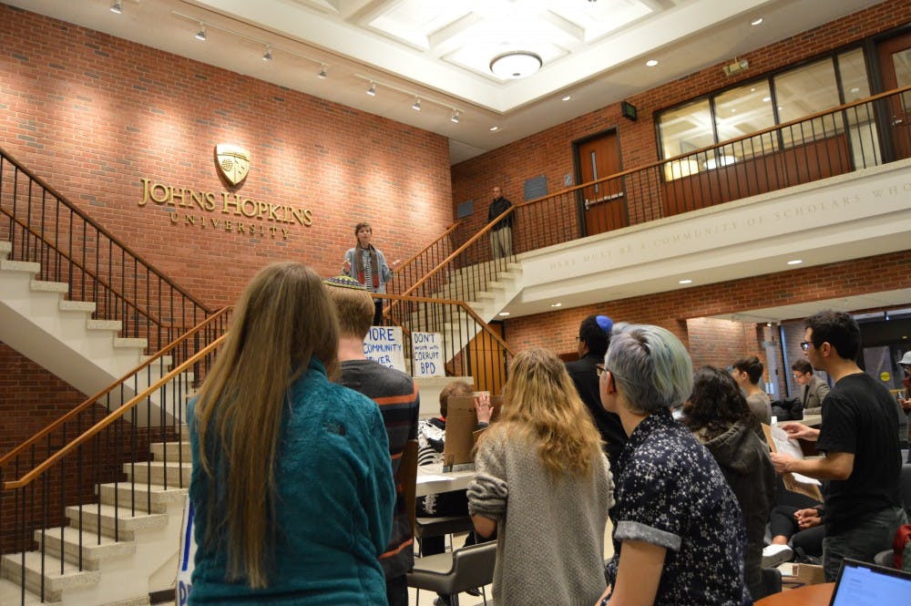 ELLIE HALLENBORG/PHOTOGRAPHY EDITOR
Students gathered in Garland Hall and spoke against the proposed police force.