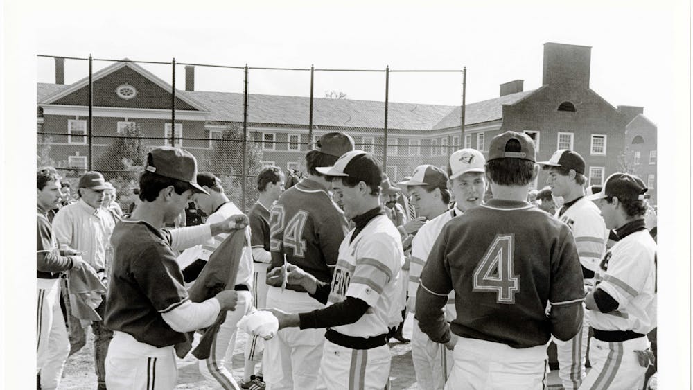 COURTESY OF THE JOHNS HOPKINS UNIVERSITY GRAPHIC AND PICTORIAL COLLECTION
Members of the baseball team exchange gifts with a visiting Soviet team in 1988, which occurred during McGuckian’s time with The News-Letter.