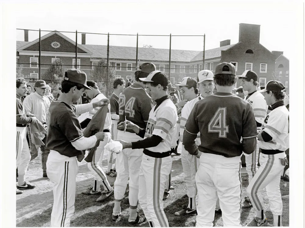 COURTESY OF THE JOHNS HOPKINS UNIVERSITY GRAPHIC AND PICTORIAL COLLECTION
Members of the baseball team exchange gifts with a visiting Soviet team in 1988, which occurred during McGuckian’s time with The News-Letter.