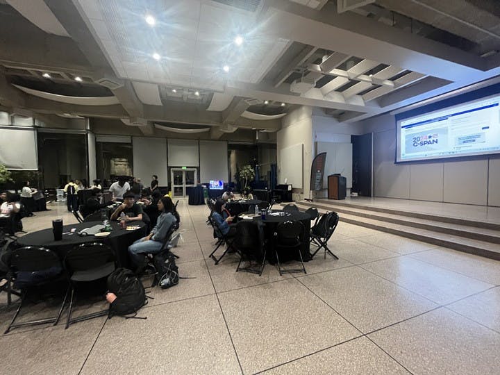 COURTESY OF SAMHI BOPPANA &nbsp;
Hopkins students gathered at the Glass Pavilion for an election watch party hosted by Hopkins Votes.&nbsp;