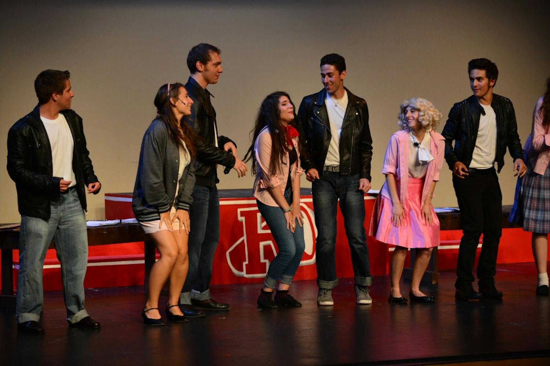GREASE IS THE WORD: In Sunday night’s production of the 24-Hour Musical, the Pink Ladies and the Greasers performed a dance together.