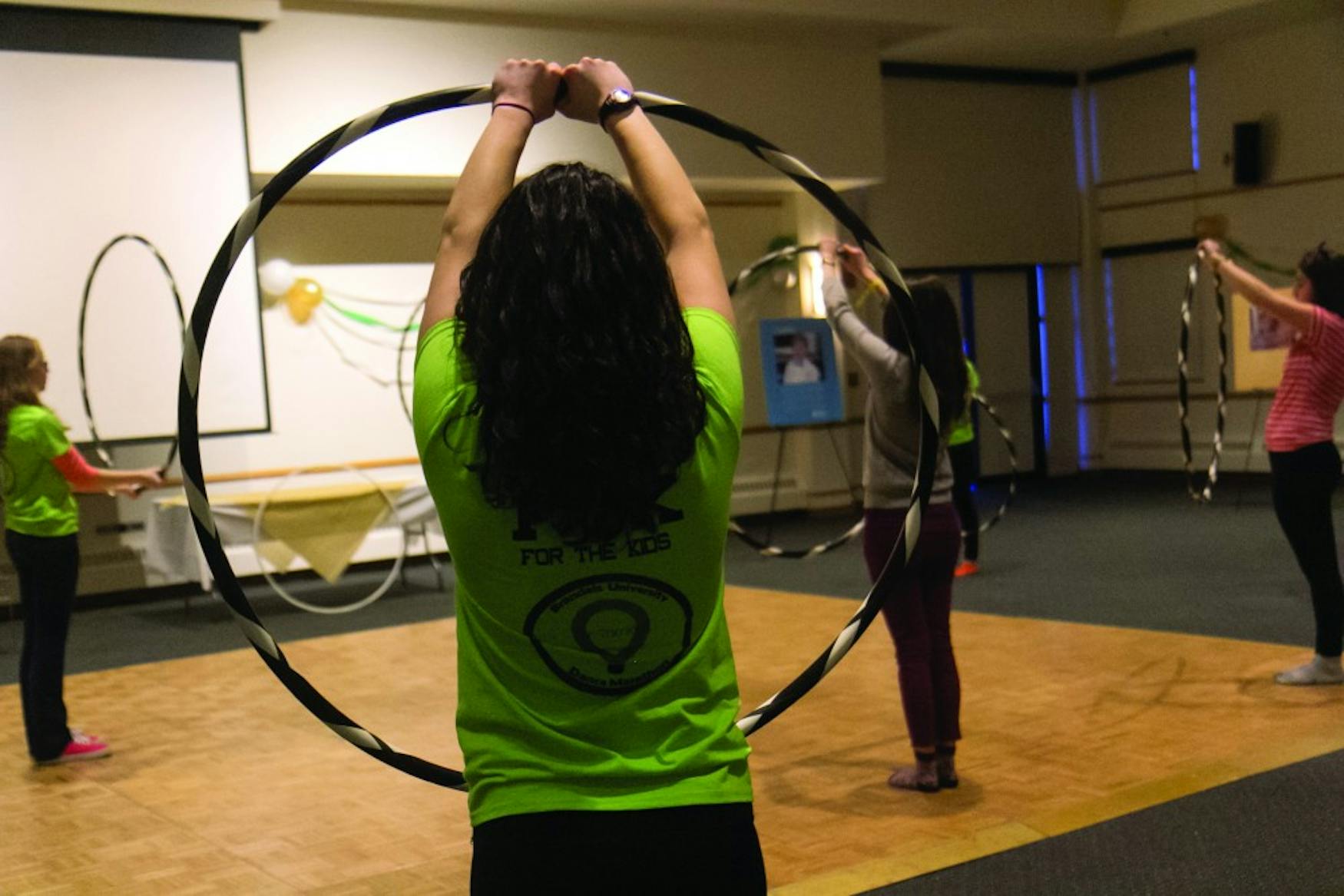 TWIST AND SHOUT: During the marathon, Samantha Rokey ’17 led a hula hooping demonstration and dance class.