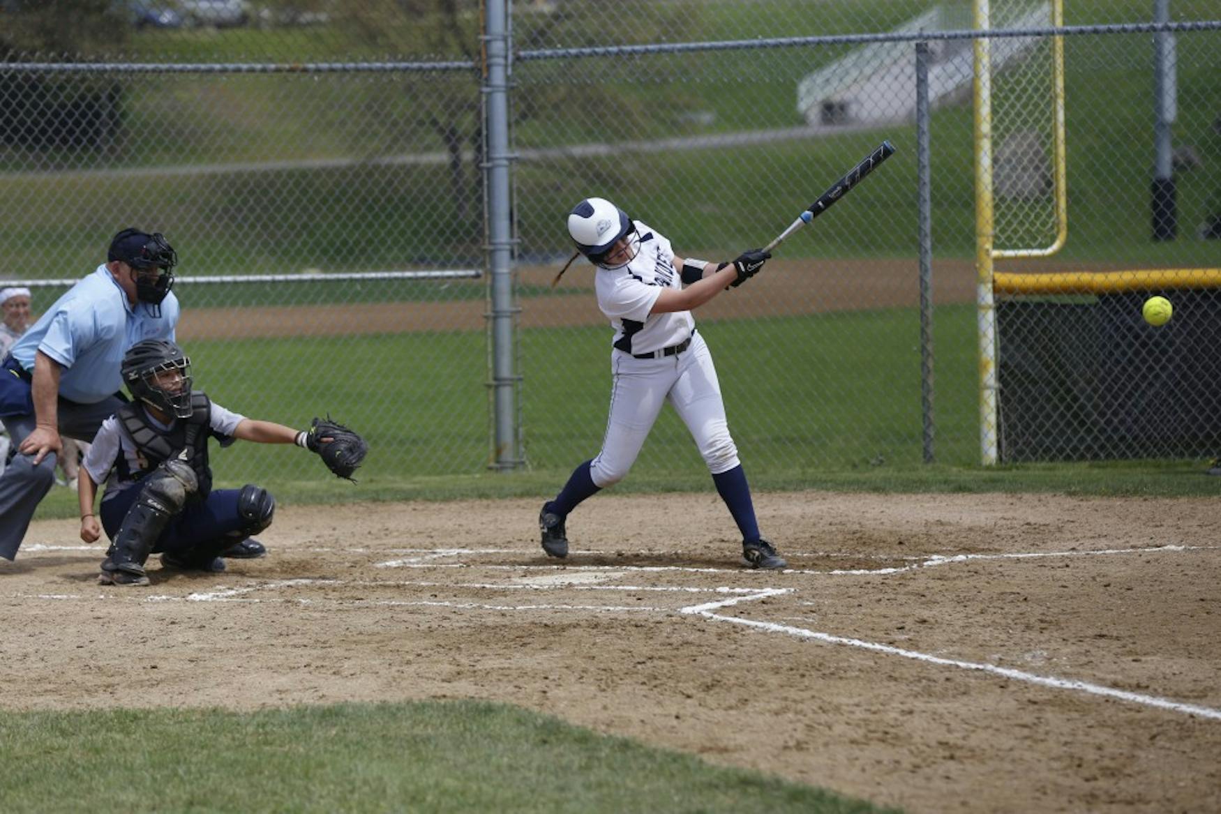 EYES ON THE BALL: Infielder Liana Moss ’17 makes contact in the Judges’ 8-6 victory against Emerson College last May.