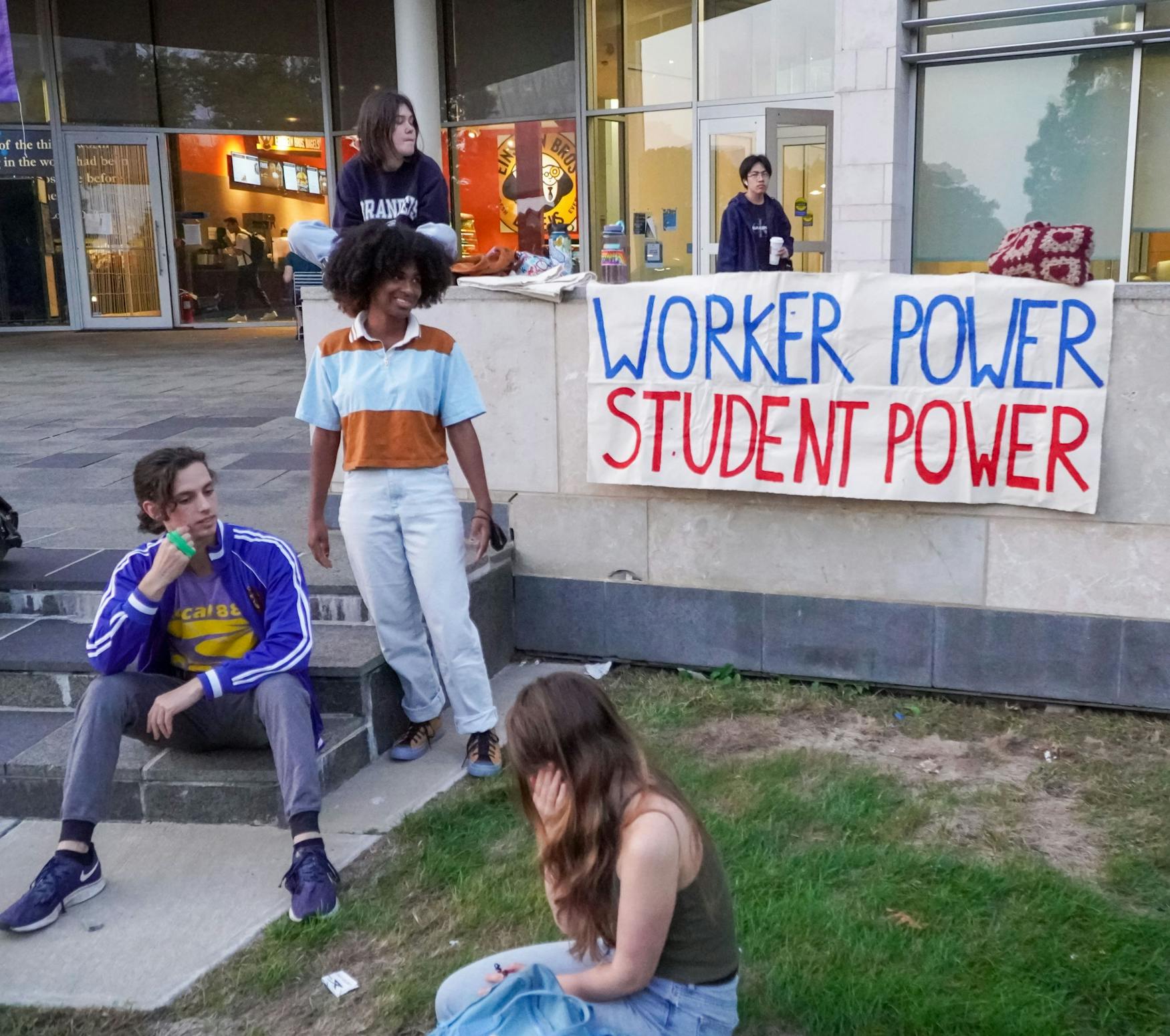 PROTEST: Students and dining hall workers gathered together to voice concerns over the treatment of dining staff.