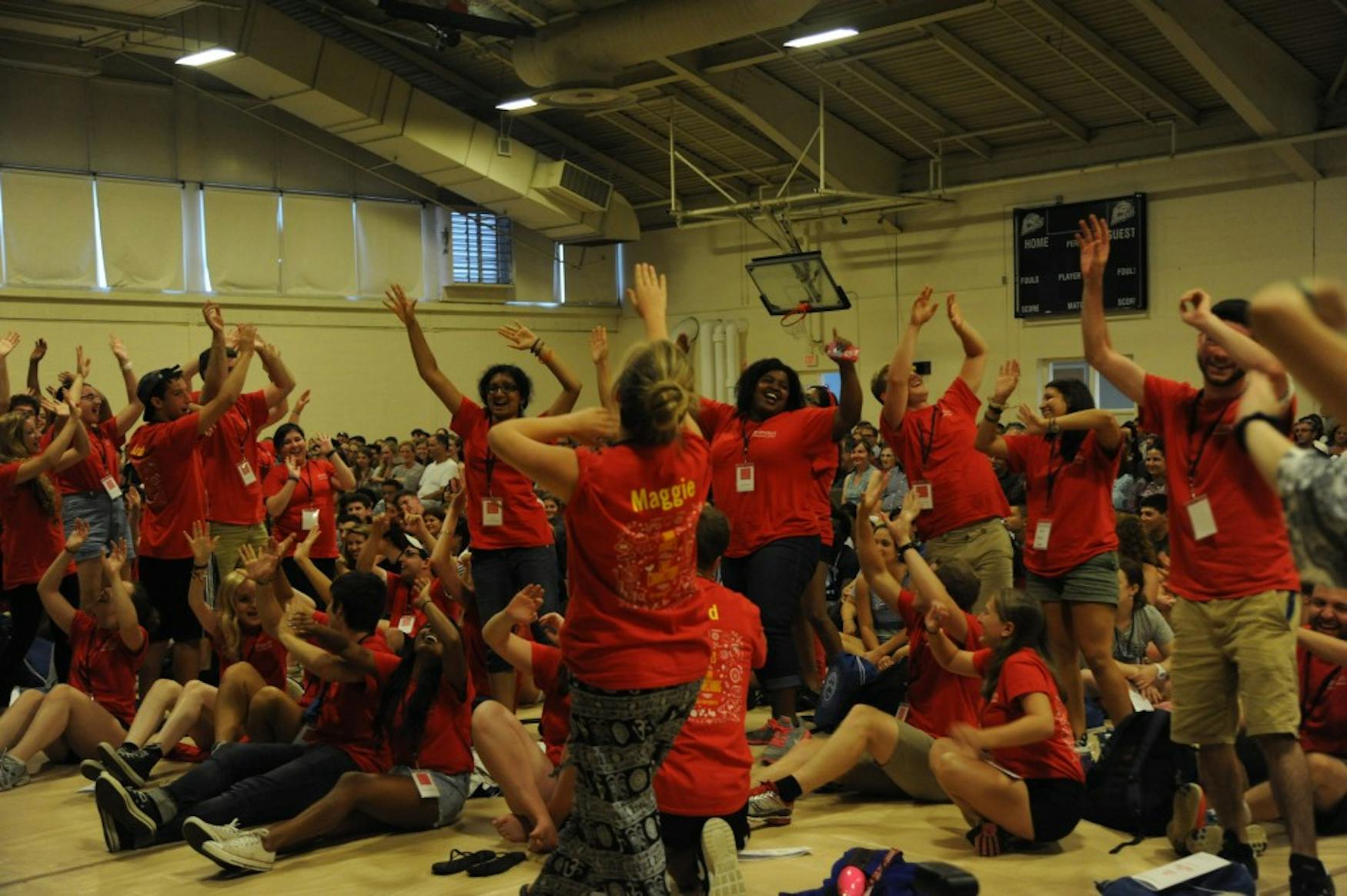 The orientation leaders cheer as the convocation for first-years and transfer students commenced on Sunday.