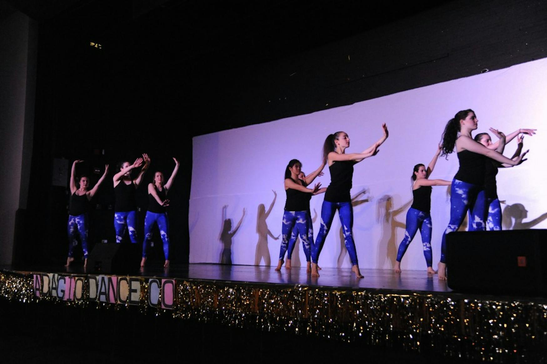 ON CLOUD NINE: Dancers performed “Hijack,” choreographed by Kiki Tringali ’17, wearing cloud patterned leggings.