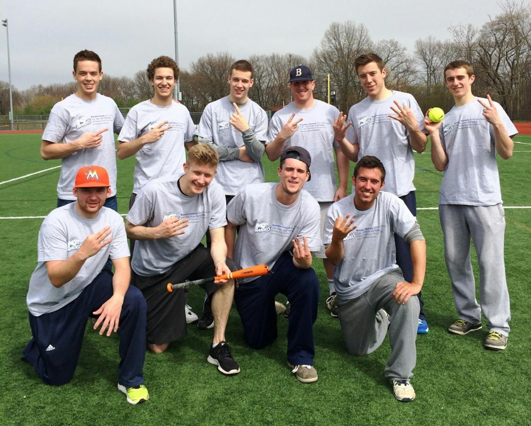 Members of the Grout Bullies pose with their new t-shirts following a 17-10 win in the championship game.
