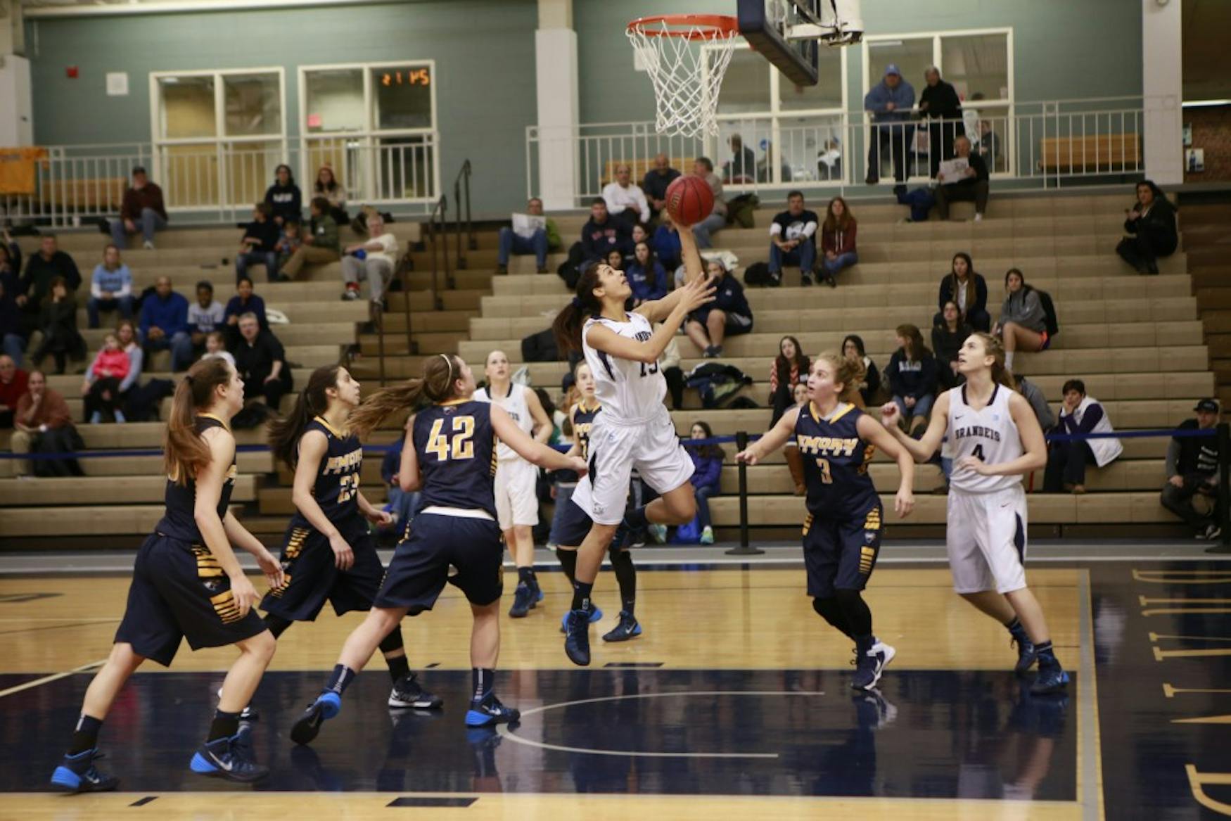 IN THE LANE: Guard Sydney Sodine ’17 drives to the basket in a 65-61 victory over Emory University on Jan 26.