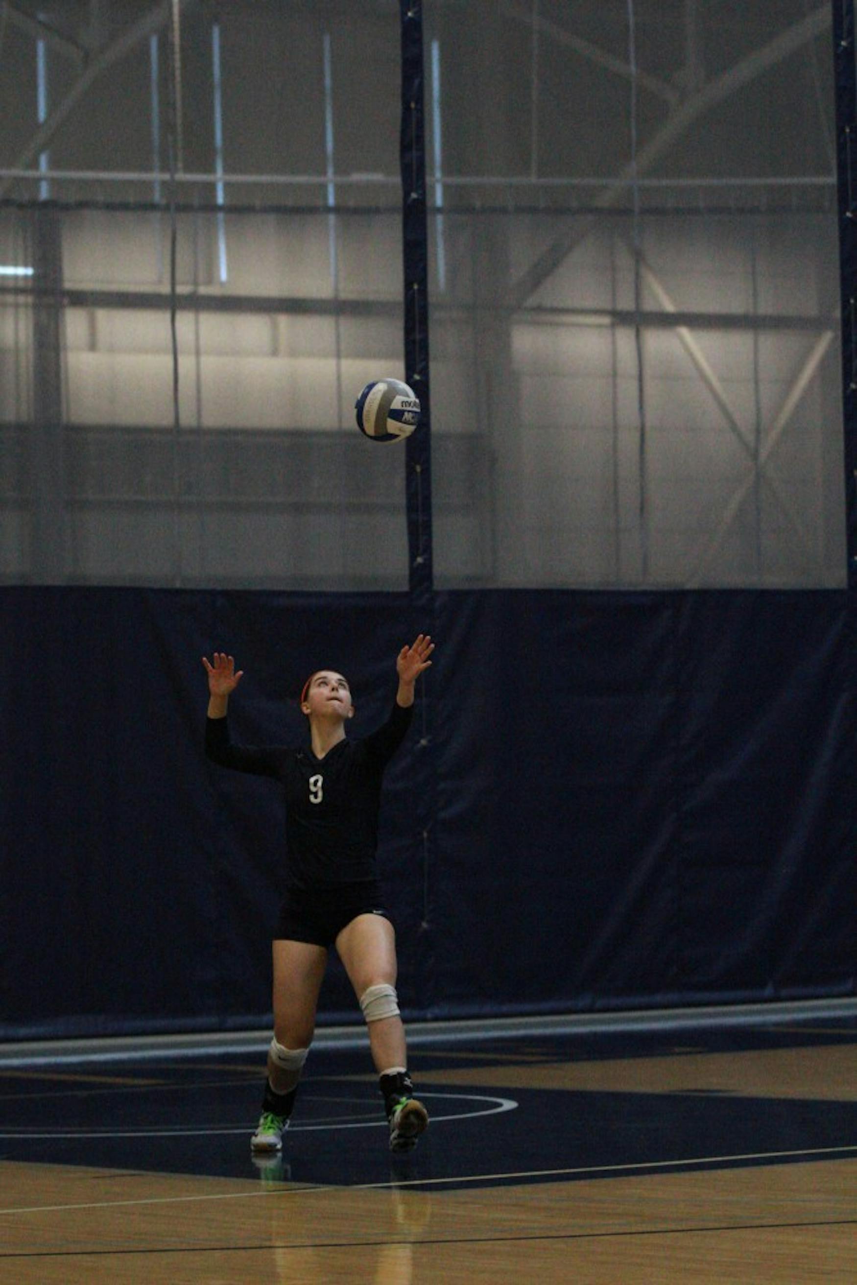 GOING FOR THE SERVE: Setter Allison Harmsworth ’17 attempts the ace during a 3-1 defeat against Vassar College on Oct. 31. at home.