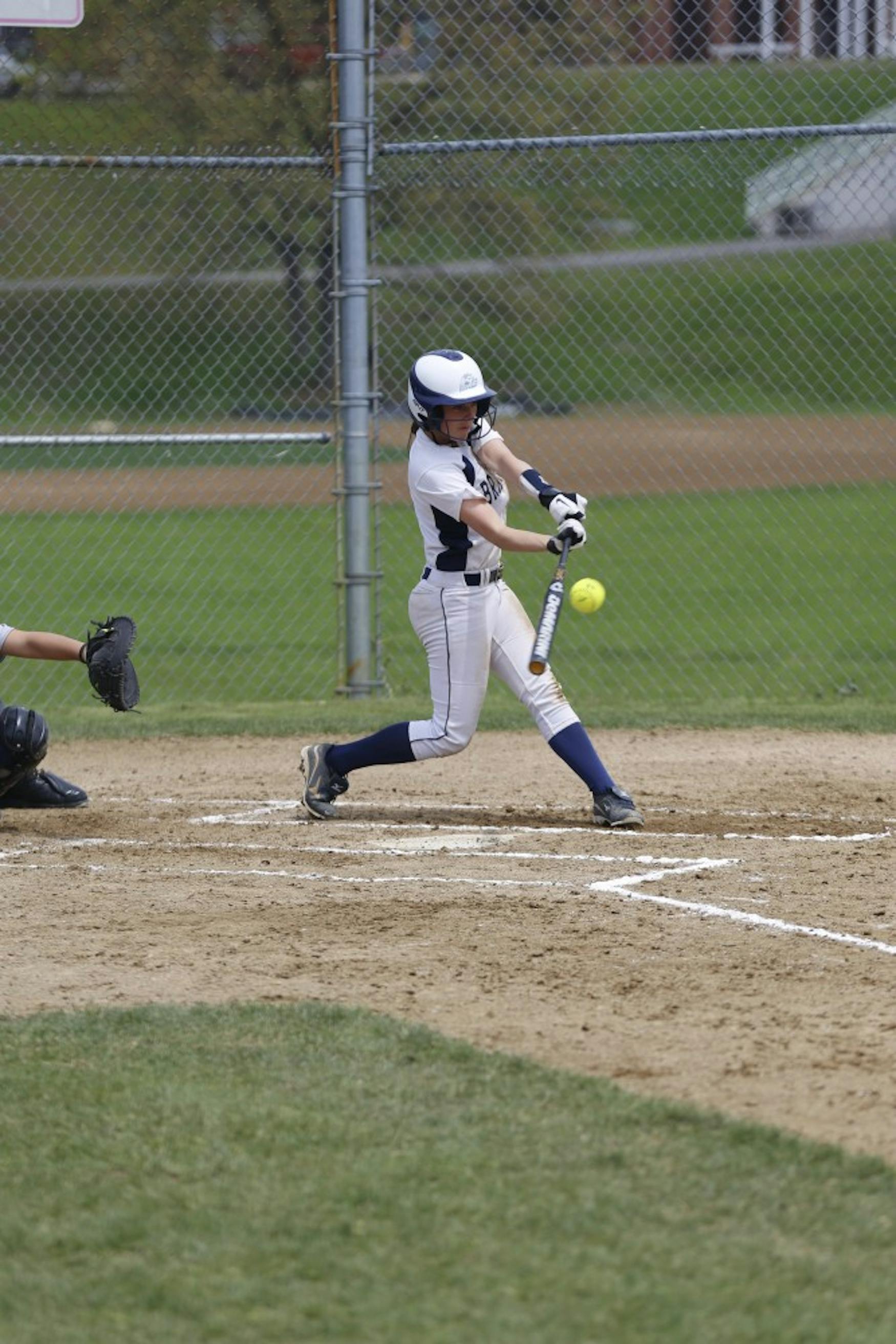 Infielder Anya Kamber ’15 makes contact during a loss to Smith College on May 10 in the ECAC Tournament.