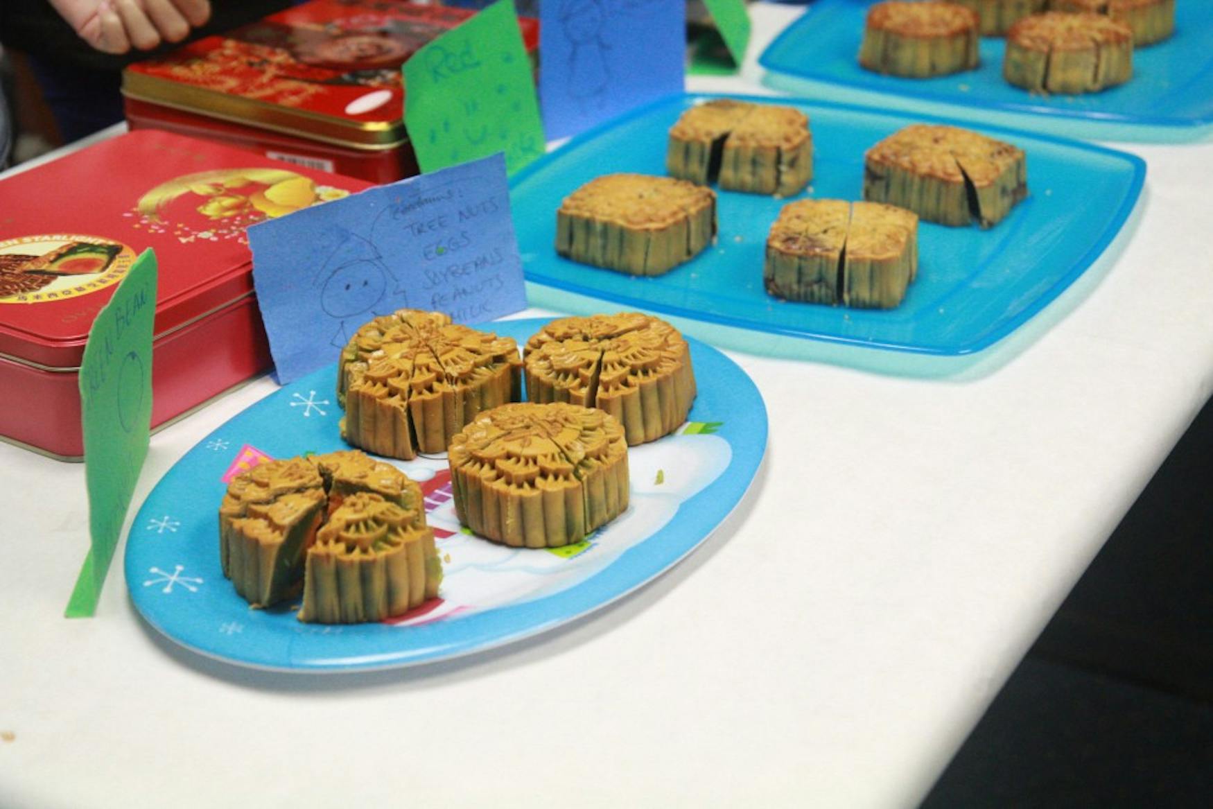 MOON MUNCHINGS: The event provided traditional mooncakes from Waltham restaurant, Tom Can Cook, for attendants to sample.