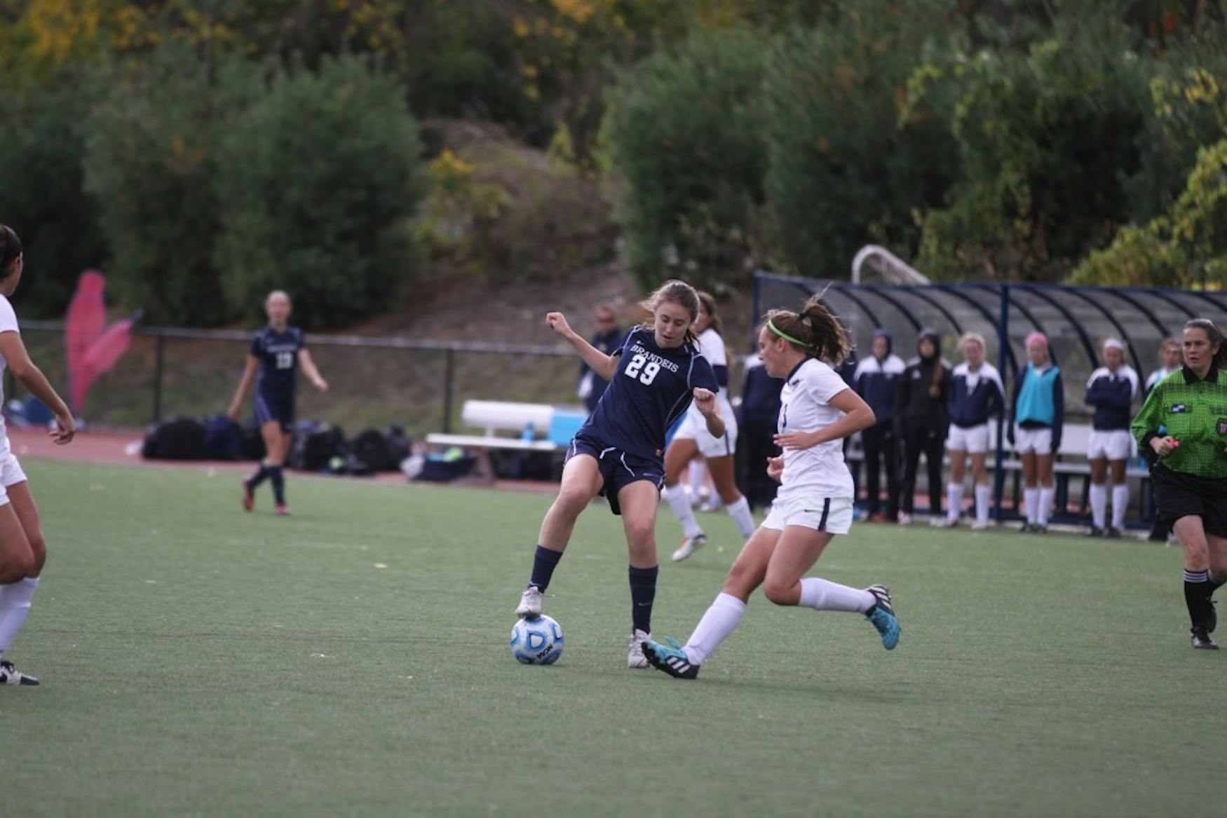 ON THE BALL: Forward Lea McDaniel ’17 dribbles around an Emory University defender in the team’s 1-1 tie on Oct. 19 at home.