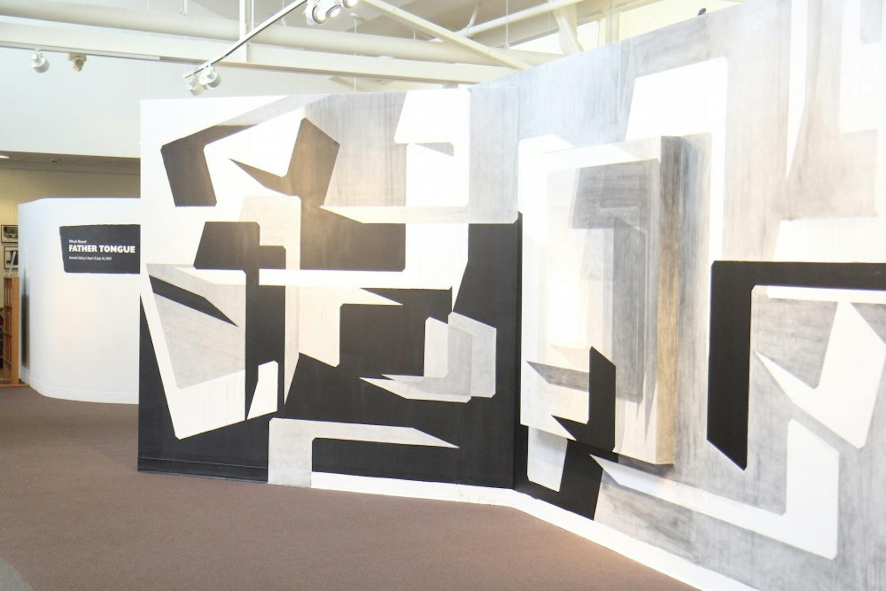 3-D PAINTING: The wall drawings use three dimensional elements, such as pieces that jut out from the wall, in order to change the way the Hebrew letters are perceived.